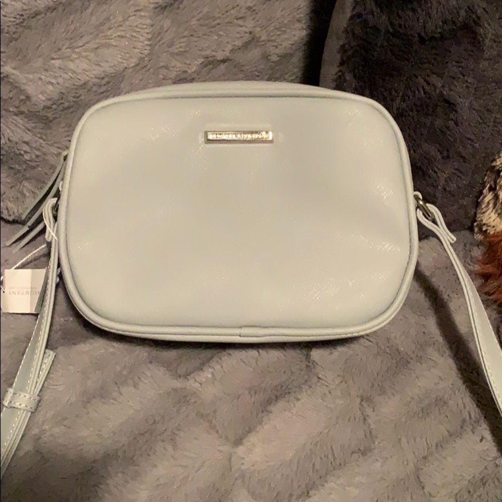 Grey purse with two separate pockets